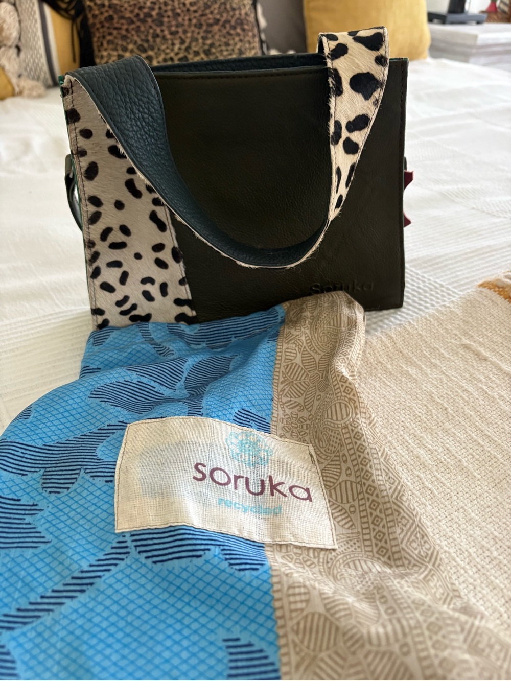 Soruka Black Leather Shoulder Bag with Dalmatian Spot Strap